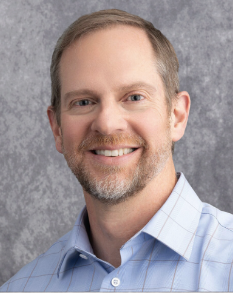 A professional headshot of David Gamm