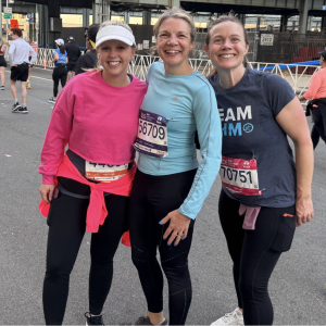Team CHM runners Mary Anne Kavjian, Christine Chambers, and Lauren Englund posing together at the TCS New York City Marathon.